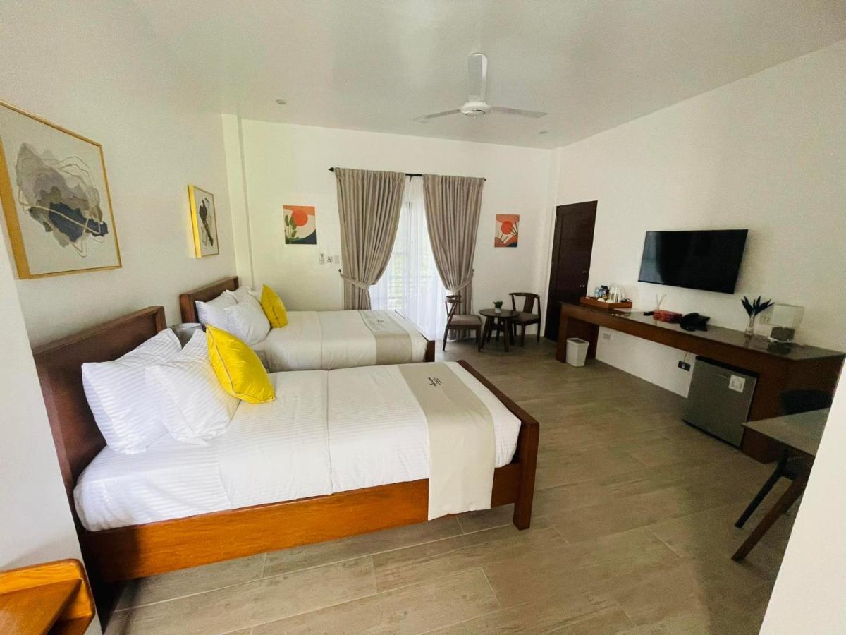 Thistle Inn Panglao Bagian luar foto